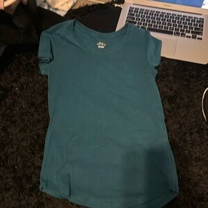 This is a dark blueish bcg shirt in a size xs.